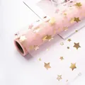 Pink mesh fabric roll with gold star patterns for floral wrapping and DIY crafts. - Starry Tulle - Korean Pink *See Details