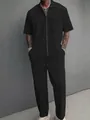Full-length shot showing the fit of the men's black leisure set with zipper collar. - S / Top And Bottom / Black