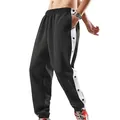 Detail of black men's track pants featuring white side stripe and snap buttons - S / Bottoms / Black and White