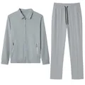 Detailed view of men's grey 2-piece casual set featuring jacquard waffle texture. - S / Top And Bottom / Gray