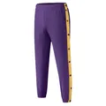 Detailed view of purple sports pants with yellow side stripes and snap buttons. - S / Bottoms / Purple