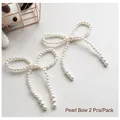 Eleganti fiocchi di perle bianche confezione da 2 per accessori capelli o artigianato - fiocco con perline / Set di 2