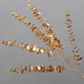 Premium golden artificial eucalyptus leaf branches for elegant home and party decor - Golden Eucalyptus Leaf Style