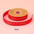 Rotes Ripsband mit goldenem LOVE IS ETERNAL Foliendruck für Geschenkverpackungen - Englisch Love Is Eternal / 2.5cm Breite / 32 Yards / Rot