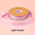 Hellila Ripsband mit Goldfolie LOVE IS ETERNAL Text für elegante Geschenkverpackungen - Englisch Love Is Eternal / 2.5cm Breite / 32 Yards / Hellviolett