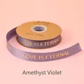 Lila 2,5 cm breites Rippband mit goldenem LOVE IS ETERNAL Aufdruck für Geschenke - Goldfolie Love Is Eternal / 2.5cm Breite / 32 Yards / Malve