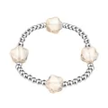 Close-up detail of a stainless steel bead bracelet with faceted star-shaped crystal beads. - Silver Tone Light Champagne Star Faceted Style (YB-1201S-NUD) / Beige