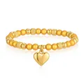 Dettagliata vista ravvicinata di un bracciale elastico in oro con ciondolo a forma di cuore - Stile Cuore Giallo Grande (YB-1199G-YEL)