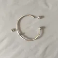 Detailed view of stainless steel open bangle with detachable screw-on ball ends - Unscrewed Ball Head DIY Open Bangle (YB-1089S) / Inner Diameter 70mm (With 2 Positioning Beads) / Steel