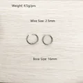 Detailed macro view of silver titanium steel hoop earrings with size specifications. - Smooth Hoop Style (YE-662S-16mm) / 16mm / Silver