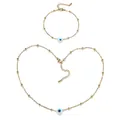 Detail view of gold bead chain necklace and bracelet set with blue evil eye charms. - Necklace and Bracelet Set / Gold-White Eye