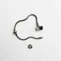 Detail of a stainless steel silver snake chain bracelet with clasp and DIY stopper bead. - 16cm / Barrel Clasp Snake Chain (YB-976) / With 2 Positioning Beads / Silver