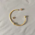 Close-up detail of gold titanium steel bangle showing the detachable screw ball mechanism - Unscrewed Ball Head DIY Open Bangle (YB-1089G) / Inner Diameter 70mm (Including 2 Positioning Beads) / Gold