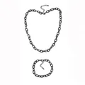 Detailed top-down view of black stainless steel beveled link chain necklace and bracelet set - Cross Chain Necklace / Black Set (Necklace + Bracelet)