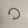 Close-up of black titanium steel open cuff bracelet with removable screw-ball heads - Unscrewed Ball Head DIY Open Bangle (YB-219BLK) / Inner Diameter 60mm (Without Positioning Beads) / Black