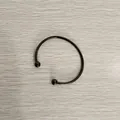 Detailed view of a sleek black stainless steel open cuff bracelet with ball ends - Unscrewed Ball Head DIY Open Bangle (YB-219BLK) / Inner Diameter 65mm (Without Positioning Beads) / Black