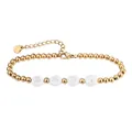 Detail view of gold beaded stainless steel bracelet with white shell BABY letter charms - BABY Letter Style / Gold