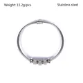 Detailed view of silver stainless steel spring coil bracelet with textured magnetic beads. - 5 Mesh Textured Beads Style (YB-028) / Silver