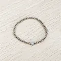 Detailed view of stainless steel beaded bracelet with an engraved heart charm. - Heart Initial M Style (YB-S1090-M) / Stretchy