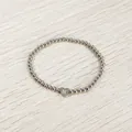Detailed view of stainless steel beaded bracelet featuring a heart charm with letter N - Heart Initial N Style (YB-S1090-N) / Stretchy