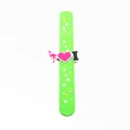 Detailed view of a green silicone slap band featuring flamingo and heart star patterns - Green