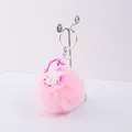 Vue détaillée d'un porte-clés pompon rose avec une jolie licorne en PVC - Style Licorne Crinière Rose (07)
