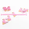 Set creativo di 7 accessori fenicottero rosa in PVC con bracciale, anelli e clip - Serie Fenicottero / Rosa (Stile 2)