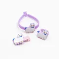 Nahaufnahme des Alpaka-Schmucksets mit lila Silikonarmband, Ring und Haarspange - Dreiteiliges Set / Lila