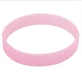 Detail view of a pink silicone glow-in-the-dark wristband for gifts and events. - Luminous Red