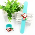 Close-up detail of blue Christmas silicone slap bracelet with cute Santa Claus motif. - Blue-Green (Style 2)