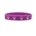 Vibrant purple silicone wristband featuring cute white paw print designs for pet lovers - Purple