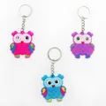 Three colorful soft PVC owl keychains in pink, purple, and blue with metal rings. - Mixed Colors