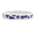 White silicone wristband featuring purple cow print and sheriff star design for cowboy parties - White Cow Print Sheriff Style