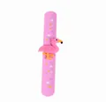 Pink silicone slap bracelet featuring a cute cartoon flamingo and tiny star patterns - Pink With Pink Head