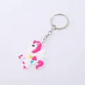 Süßer weiß-pinker Einhorn-Schlüsselanhänger aus weichem PVC mit Herzen. - Rosa Mähne Mit Herz
