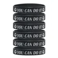 Durable black silicone sports wristband featuring motivational soccer YOU CAN DO IT text. - Black