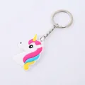 Bunter Cartoon-Einhorn-Schlüsselanhänger aus weichem PVC mit einer Regenbogenmähne. - Goldenes Horn Regenbogenmähne