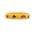 Yellow cowboy themed silicone wristband with black sheriff star and hat icons for party - Yellow Sheriff Badge Style