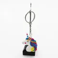 Cartoon Einhorn Schlüsselanhänger aus buntem PVC-Weichgummi, ideal als Taschenanhänger - Regenbogenmähne Rosa Herz