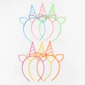 Vista dettagliata di cerchietti unicorno in plastica colorata per feste e regali bimbi. - Cerchietto / Set da 12