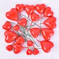 Vibrant red heart-shaped cake toppers in various sizes for romantic baking decoration - Heart Shaped / 20 Pieces Set / Red