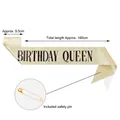 Macro view of gold glitter birthday queen sash showing dimensions and included safety pin accessory - Queen / 160x9.5cm (With Safety Pin) / Gold with Black Text