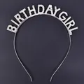 High-quality detail of a silver metal 'BIRTHDAY GIRL' headband with clear rhinestones. - Metal Headband / Silver