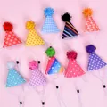 Variety pack of 10 colorful mini pet party hats with assorted patterns and pompoms - Printed Felt Hat Style A / 10 Pieces Pack / Style A (10 Pack)