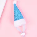 Detailed view of blue glitter pet Christmas hat with adjustable chin strap - Blue