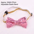 Close-up view of a pink sequined pet bow tie featuring an adjustable gold elastic band - Bow Tie / Pink
