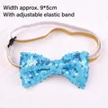 Close-up detail of a light blue sequined pet bowtie featuring an adjustable gold elastic strap. - Bow Tie / Blue