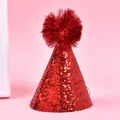 Detailed view of a sparkling red glitter pet birthday hat featuring a fluffy tinsel pom-pom. - Thick Glitter Pompom / Red