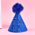 Detailed macro view of vibrant blue glitter pet birthday hat featuring a fluffy pom-pom top - Thick Glitter Pompom / Sapphire Blue
