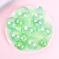 Iridescent green decorative balls for party cake toppers and festive ornaments in a bowl - Set of 12 / Green